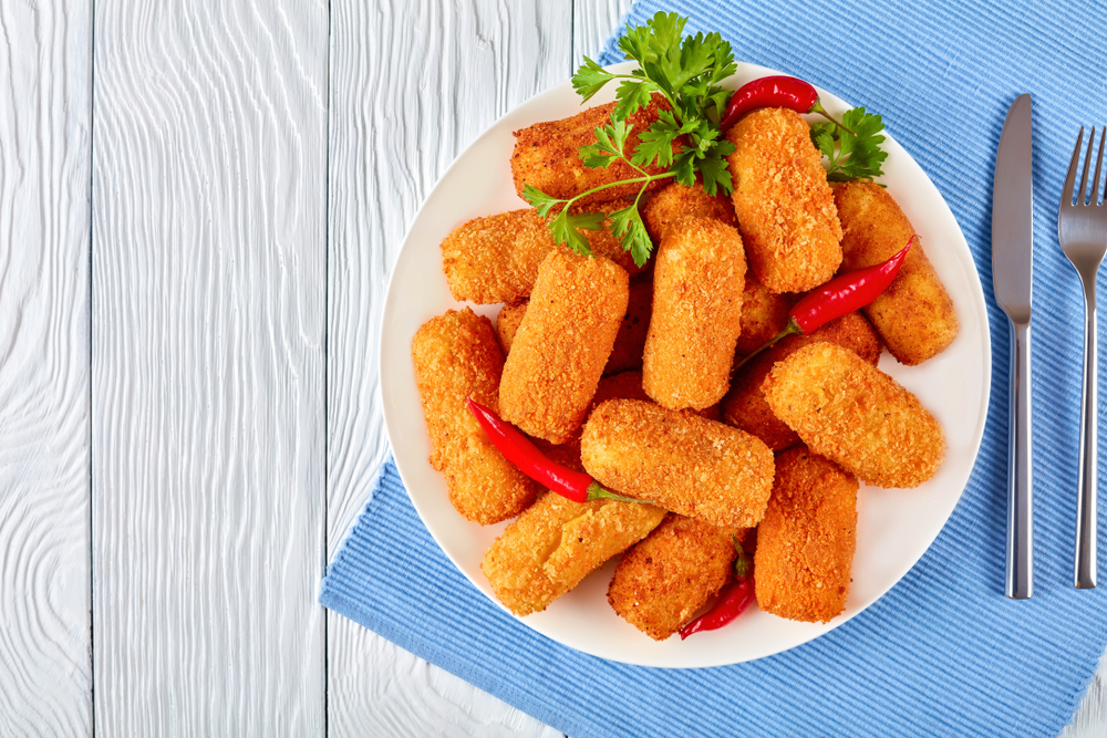 Quality Food Products - CHICKEN NUGGETS